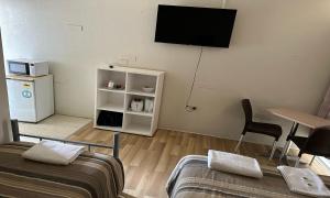 TV a/nebo společenská místnost v ubytování St George Hotel Motel