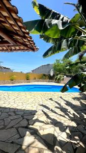 The swimming pool at or close to Pousada Bosque dos Papagaios