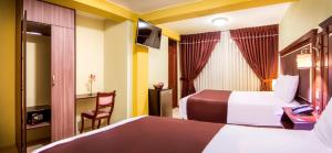 Katil atau katil-katil dalam bilik di Hotel D'Carlo Class
