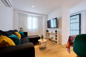 TV a/nebo společenská místnost v ubytování El Deseo + 18 fotografií