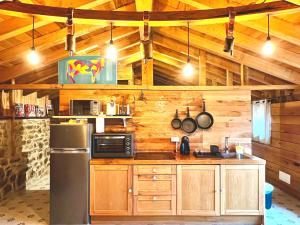 A kitchen or kitchenette at La Cabaña María