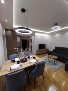 TV a/nebo společenská místnost v ubytování Lider Lux Apartman