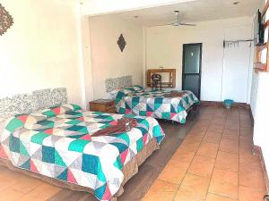 Afbeelding uit fotogalerij van Hotel Porto Bello in San Pedro La Laguna