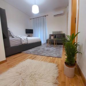 Ένα ή περισσότερα κρεβάτια σε δωμάτιο στο Eva's Cosy House