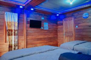 TV a/nebo společenská místnost v ubytování Golden Orchid Villa