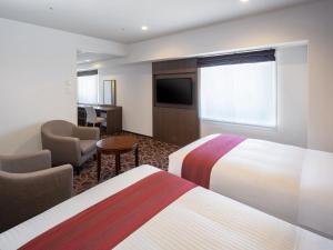 TV a/nebo společenská místnost v ubytování Art Hotel Niigata Station