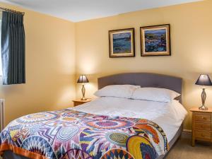 Ένα ή περισσότερα κρεβάτια σε δωμάτιο στο Flanders Cottage