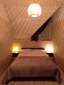 Postel nebo postele na pokoji v ubytování Apartaments Gory