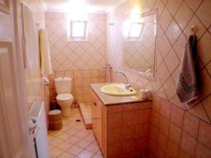 Koupelna v ubytování Metaxa Hotel