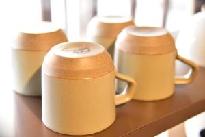 高知市にある一棟貸切 STAY UWU 002 retro houseのコーヒーマグカップ