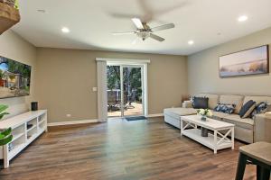 a living room with a couch and a ceiling fan at 26211 Antioch in Antioch