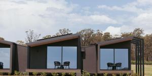 a rendering of a house with chairs in it at The Lane Retreat in Pokolbin