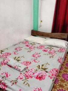 Postel nebo postele na pokoji v ubytování Dadods homestay