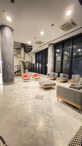 Posezení v ubytování Apartamento dentro de Hotel jardins garagem inclusa