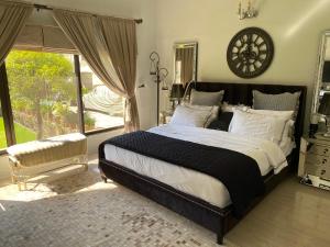 Postel nebo postele na pokoji v ubytování Kalim Casa