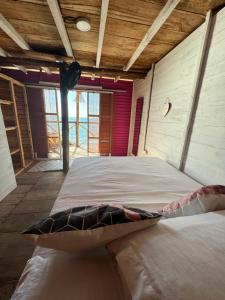 a bedroom with two beds in a room at Tequila SunBeach Baru Eco-Hotel in Baru