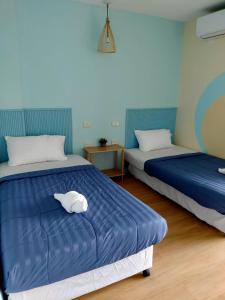 Postel nebo postele na pokoji v ubytování Castaway's 420 + 21 fotografií