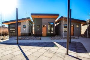 a building with two poles in front of it at The Drift in Pagosa Springs