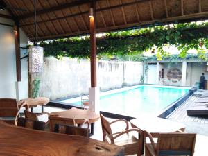 Bazén v ubytování De'dalam two storey nebo v jeho okolí