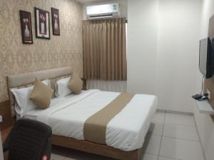 Katil atau katil-katil dalam bilik di Hotel Md Residency