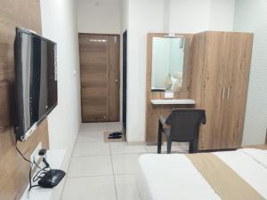 Televisyen dan/atau pusat hiburan di Hotel Md Residency