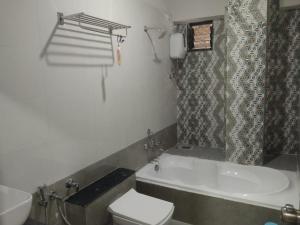 Bilik mandi di Hotel Md Residency