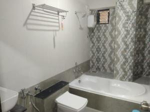 Bilik mandi di Hotel Md Residency