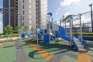 a playground with a slide in a park at Iskandar Puteri Sunway Grid Residence Deluxe Loft by Ningle Loft in Kampong Pendas