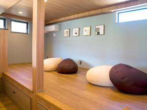 Ένα ή περισσότερα κρεβάτια σε δωμάτιο στο Rakuten STAY Fuji Kawaguchiko Station +49 φωτογραφίες