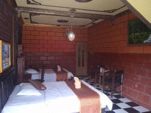 Letto o letti in una camera di Yoschi's Hotel Bromo