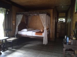 Letto o letti in una camera di Yoschi's Hotel Bromo