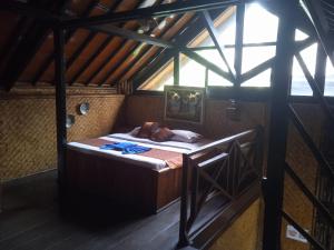 Letto o letti in una camera di Yoschi's Hotel Bromo