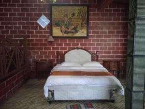 Letto o letti in una camera di Yoschi's Hotel Bromo