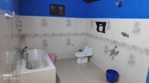 Ванная комната в Babu Farm Restaurant