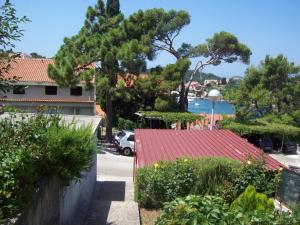 a view of a house with a red roof at Apartment STJEPKO in Cavtat