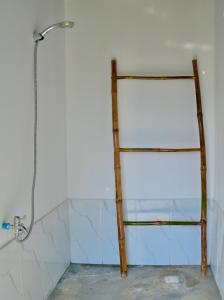 a glass shelf in a bathroom with a shower at Koh Rong Lagoon in Kaôh Rŭng (3)