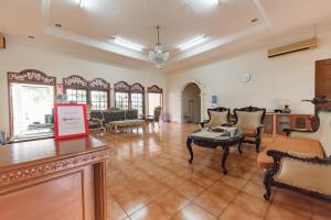 Posezení v ubytování RedDoorz Plus at Wisma Kenanga Sukabumi