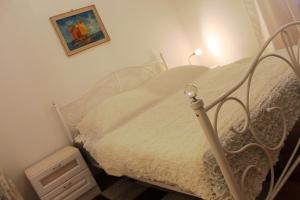 Postel nebo postele na pokoji v ubytování Ana Apartment