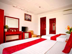 Postel nebo postele na pokoji v ubytování Vera Hotel Hà Nội