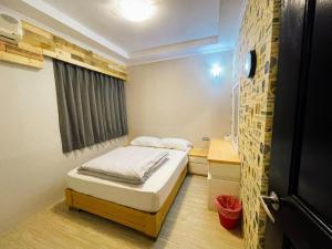 Postel nebo postele na pokoji v ubytování 東澳 露境東岳 露境公社背包客棧