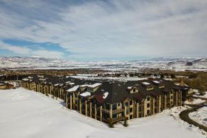 an aerial view of a building in the snow at Kestrel by AvantStay Close to the Ski Slopes in this Majestic Home in Park City in Park City