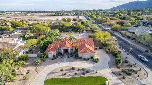 an aerial view of a house with a street at Paradise Valley by AvantStay Expansive Oasis w Putting Green Pool Mtn Views in Scottsdale