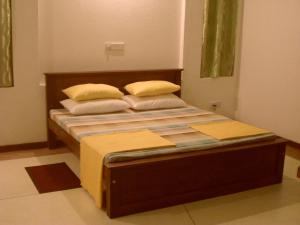 Postel nebo postele na pokoji v ubytování Nilas Guesthouse