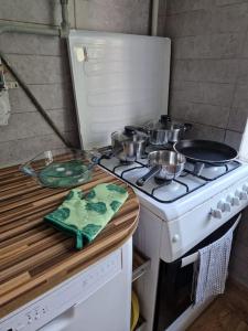 Kuchyň nebo kuchyňský kout v ubytování Sea Wave apartment