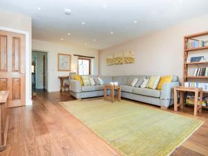 a living room with a couch and a table at 4 bed property in Instow Devon 59699 in Instow