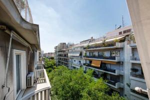 a view of an apartment building from a balcony at GLAMOROUS APARTMENT IN KOLONAKI CENTER in Athens