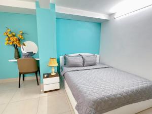 Postel nebo postele na pokoji v ubytování Thắng Hà Hotel