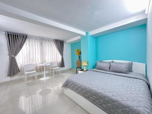 Postel nebo postele na pokoji v ubytování Thắng Hà Hotel