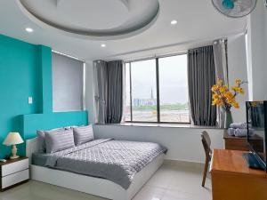Postel nebo postele na pokoji v ubytování Thắng Hà Hotel