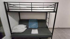 Двуетажно легло или двуетажни легла в стая в Studio et parking avec plage à 350m